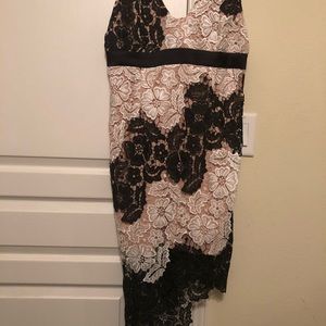 Bardot cocktail dress with spaghetti straps.